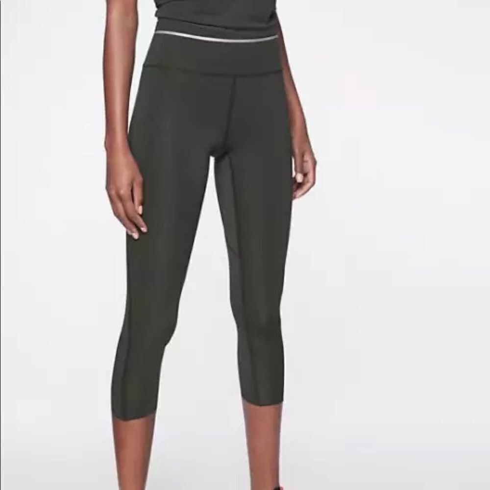 Athleta Sonic Reflective Capri Olive green leggings